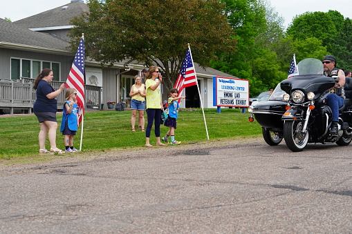 Neillsville, Wisconsin USA - May 29th, 2023: Hundreds of veteran group motorcyclists showed up at High Ground for the Memorial Day veteran honoring ceremony.