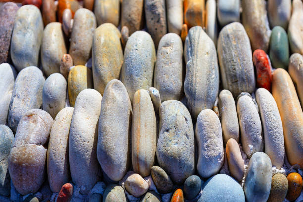 colorful pebble stones on the beach, closeup of photo