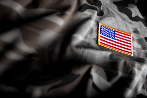 Bandera estadounidense y Camoflage (militar serie photo