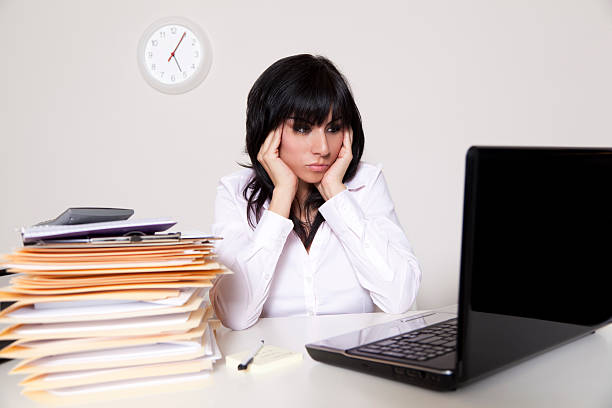 Stressed out businesswoman stock photo