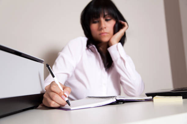 istock Hispanic business woman multi tasking 154945353