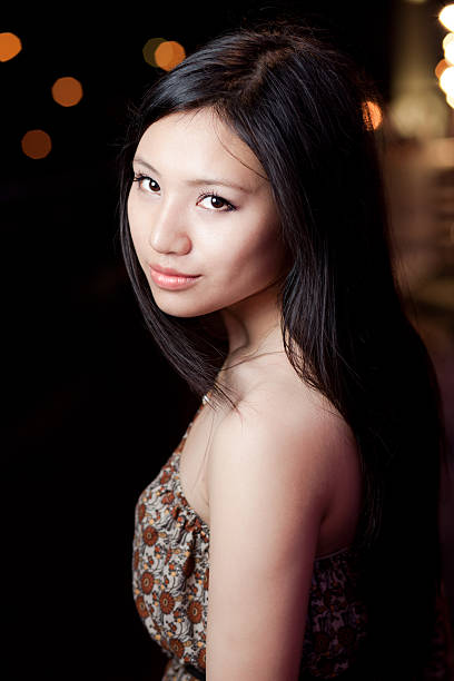 istock Asian Girl Looking over Shoulder 154946463