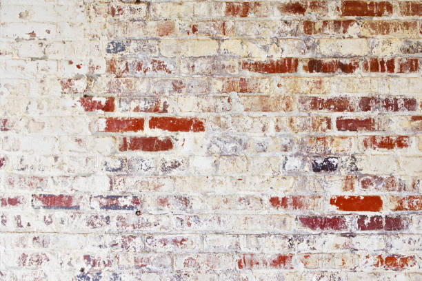istock Grunge brick wall with peeling paint 154946646