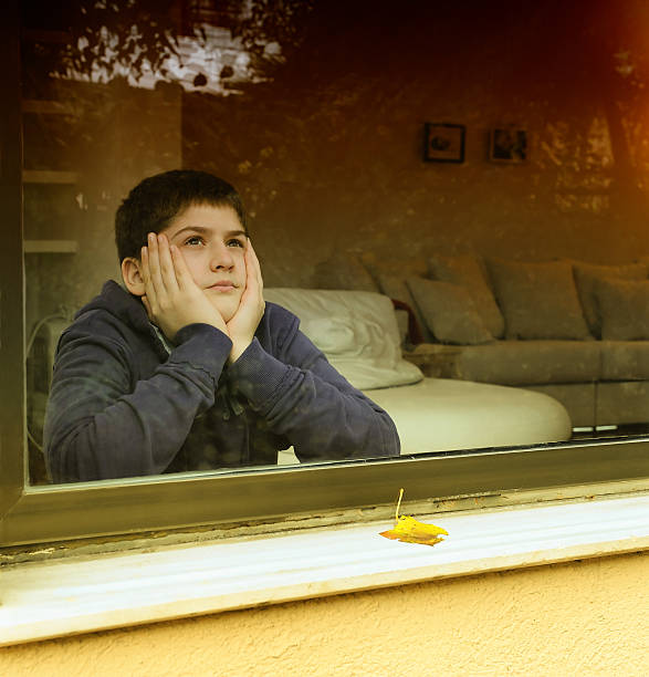 Dreaming in front of the window