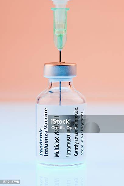 Bottle Of Vaccine With Syringe Stock Photo - Download Image Now - Vaccination, Cold And Flu, Flu Virus