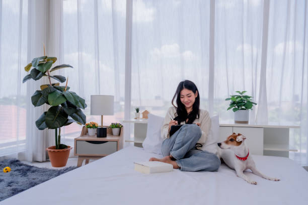 istock woman and her pet dog 1549470536