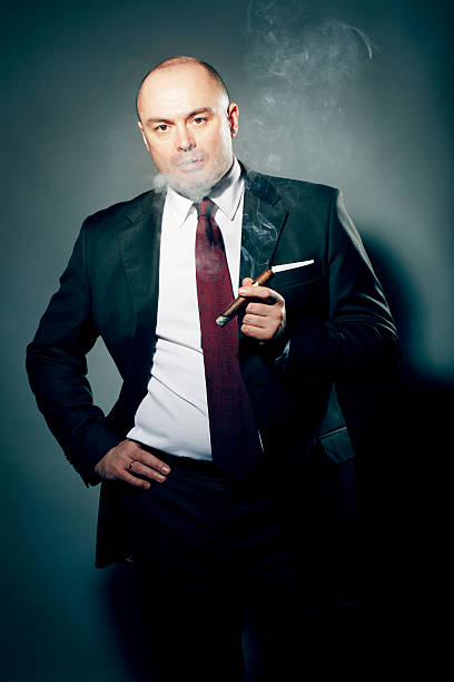 istock Dramatic Portrait of Cigar Smoker 154947173