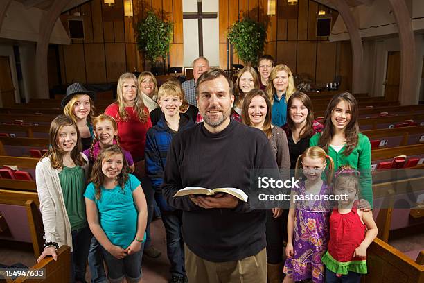 Friendly Smiling Church Indoors Group Pastor Stock Photo - Download Image Now - Congregation, Church, Minister - Clergy