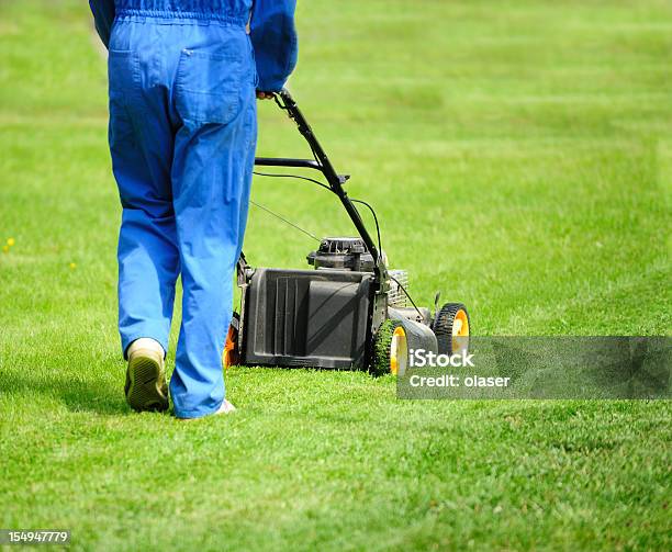 Mowing The Lawn Stock Photo - Download Image Now - Mowing, Adult, Agricultural Field