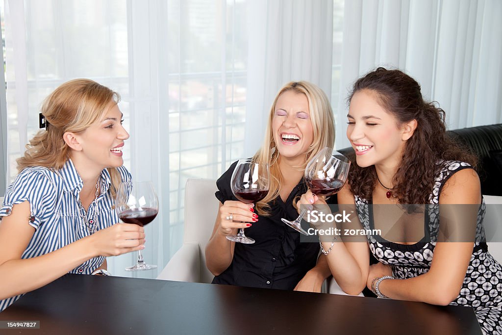 Friends toasting with red wine  Adult Stock Photo