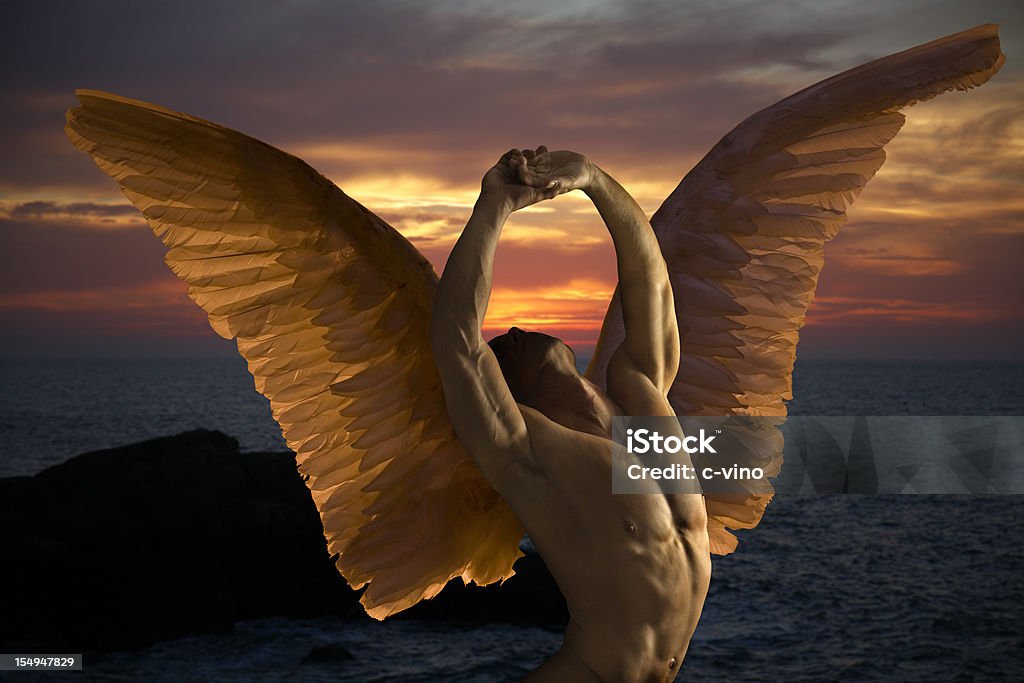 Dark angel in sunset Dark angel in ecstasy Angel Stock Photo