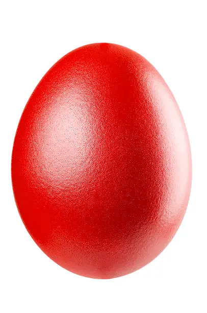 A lovely red metallic egg on white background. Studio shot.