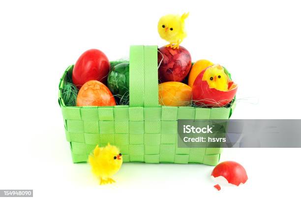 Easter Eggs With Young Chicken In A Green Basket Stock Photo - Download Image Now - Animal, Animal Egg, Basket
