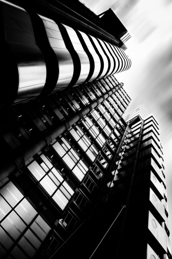 Multiple exposure image of the brilliantly modern Lloyds building in central london, in the architectural style known as High-Tech.
