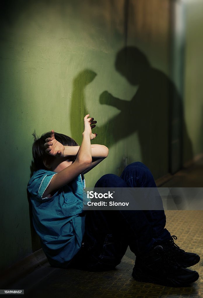 Child victim Child is protected from blow Child Stock Photo