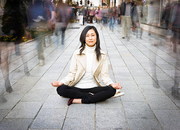 Woman Relaxing in a Crowded Street