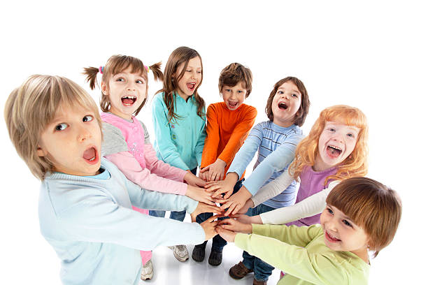 istock Cheerful kids holding their hands together. 154948663