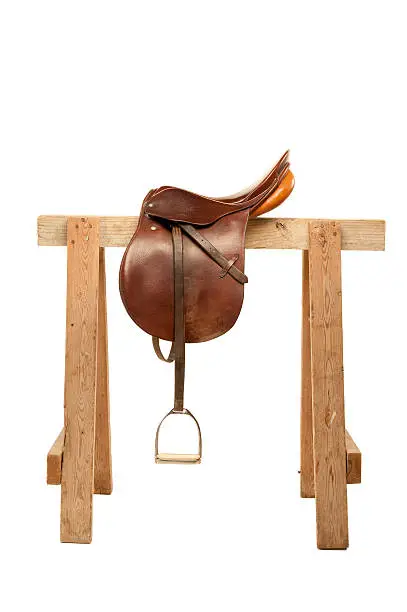 A English style saddle isolated on a white background.