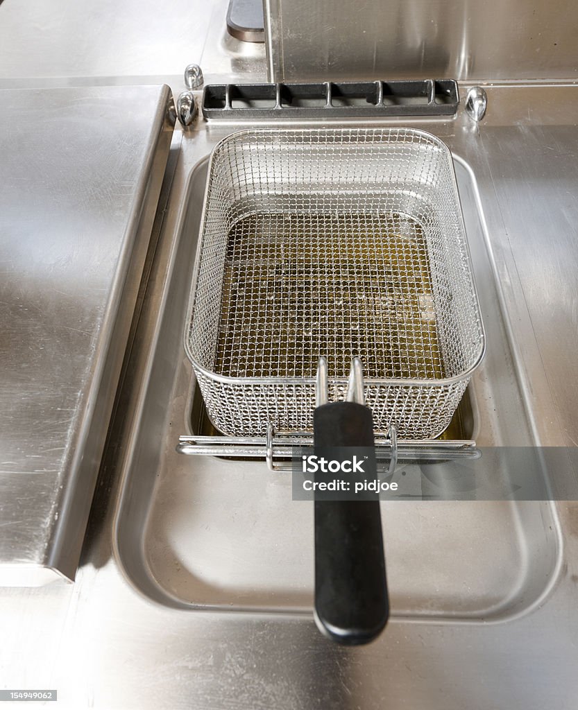 Vacío freidora en el restaurante de cocina - Foto de stock de Freidora libre de derechos