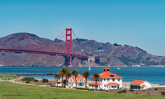 Taken from the San Francisco Presidio to show some of the restored military buildings with the North Tower of the Golden Gate Bridge and the Marin Headlands in the background.