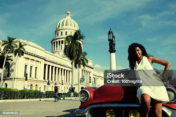 Attractive Cuban Woman Posing By The El Capitolio Stock Photo - Download Image Now - Adult, Architecture, Building Exterior