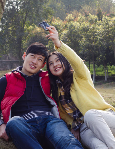 istock Taking self portrait by smart phone 154952031