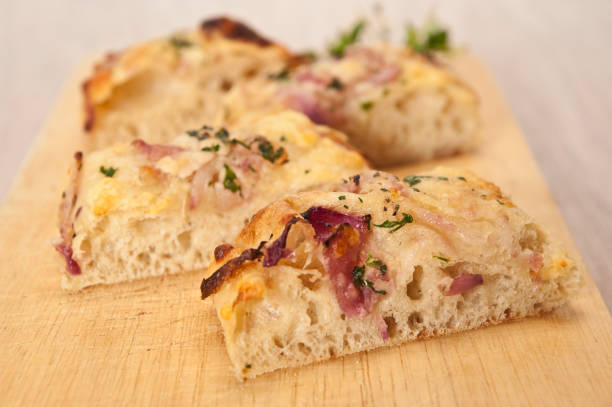 Italian Focaccia Bread With Herb, Red Onion and Cheese Topping