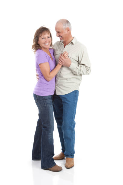 istock Attractive Happy Mature Couple Dancing on White Background 154952410