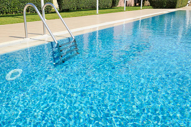 Beautiful Outdoor Hotel Swimming Pool in Sunshine stock photo