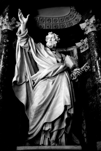 Series of the twelve Apostles. Statue of Saint Peter, one of the sculptures of the Twelve Apostles inside the Basilica of St. John Lateran. Rome, Italy. Sculpture by Pierre-Étienne Monnot (1657, Orchamps-Vennes - 1733, Roma), 