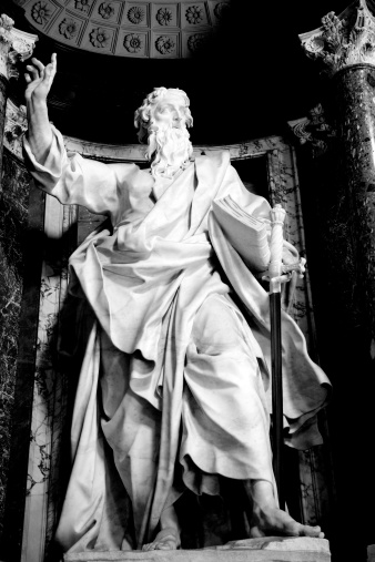 Series of the twelve Apostles. Statue of Saint Paul, one of the sculptures of the Twelve Apostles inside the Basilica of St. John Lateran. Rome, Italy. Sculpture by Pierre-Étienne Monnot (1657, Orchamps-Vennes - 1733, Roma), \