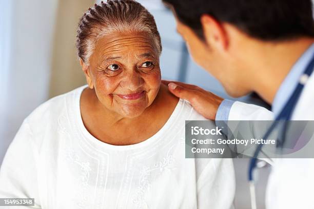 Patient Listening To Doctor Stock Photo - Download Image Now - Doctor, Patient, Senior Adult