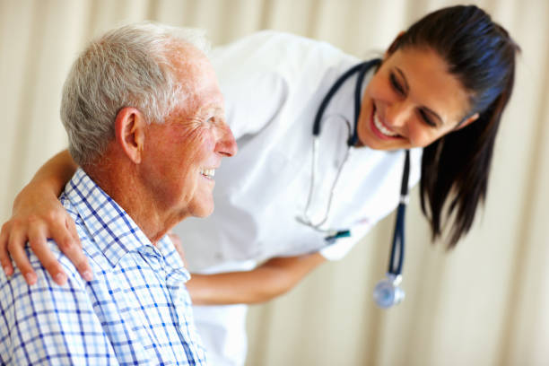 istock Doctor comforting senior man 154953370