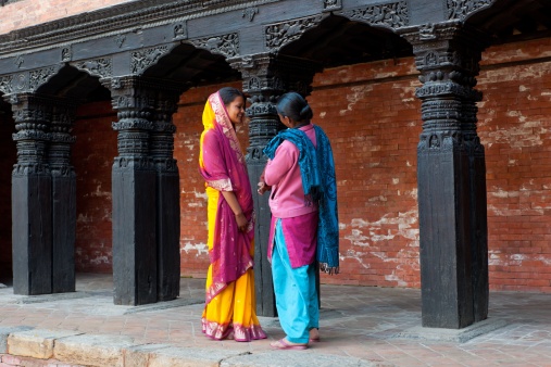 two woman are talking in Kathmandu