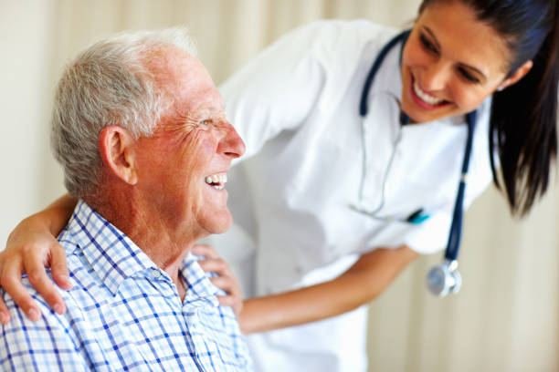 istock Doctor having a friendly conversation with patient 154953644