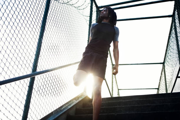 istock Athlete Stretching on Early Morning Training Run 154953781
