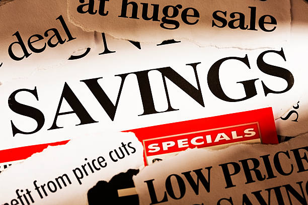 istock Savings in the spotlight among stack of press headlines 154953786