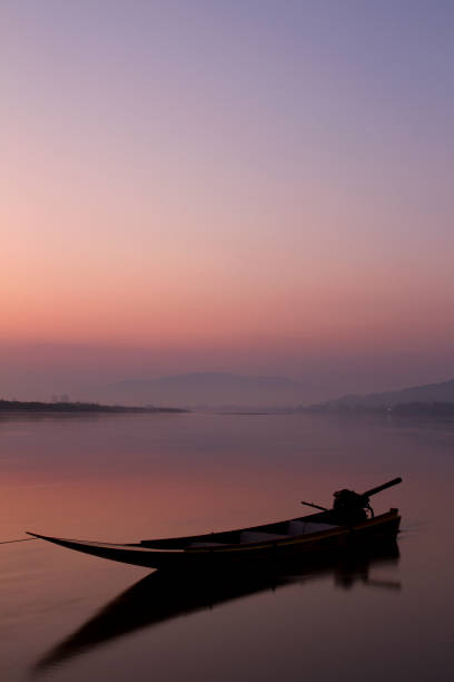 istock Lonely boat on the Mekong river in Thailand 154953961