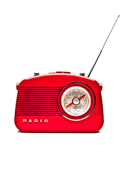 Retro red radio isolated on a white background.
