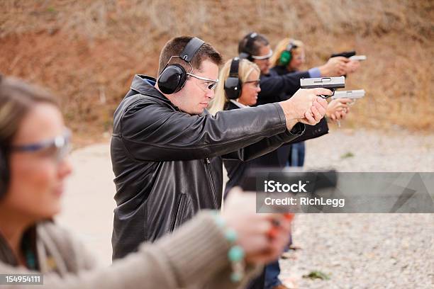 Practicing At The Shooting Range Stock Photo - Download Image Now - Target Shooting, Gun, Handgun