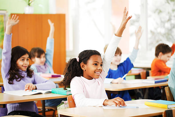 istock Children respond to the task in classroom. 154954261