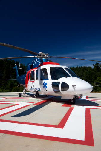 Air Ambulance medevec helicopter sitting on a hospitals helipad.