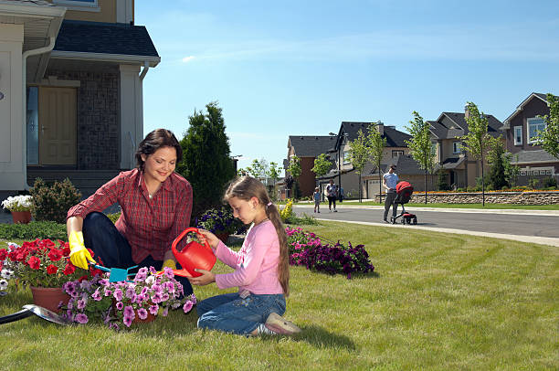 istock Mother and daughter gardening on 154954342
