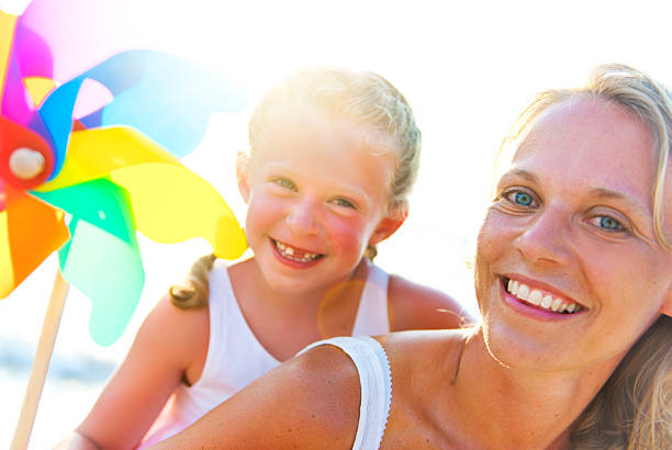 istock Mother and daughter bonding on the beach 154954454