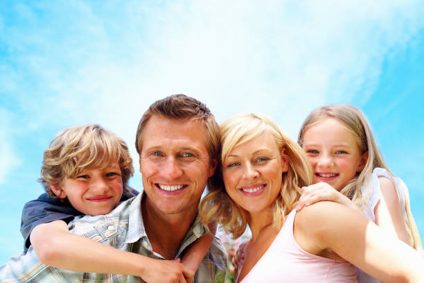 istock Couple enjoying leisure time with their kids 154954559