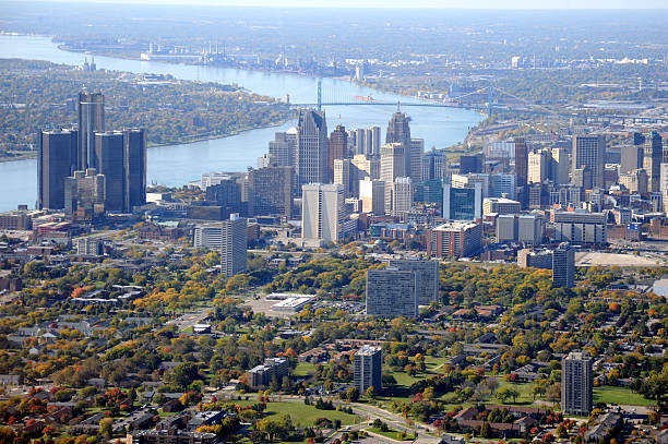 Aerial View of Detroit, Michigan USA Aerial view of Detroit, Michigan, on the Detroit River, looking south.  helicopter point of view photos stock pictures, royalty-free photos & images