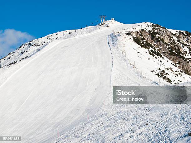 Skiing In Mountains Stock Photo - Download Image Now - Alpine Skiing, Beauty In Nature, Blue