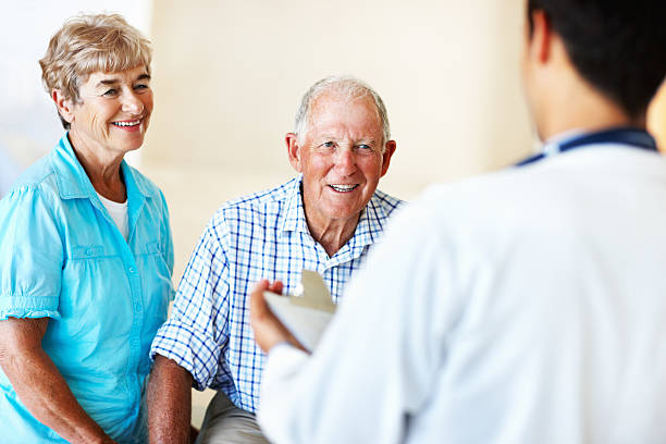 istock Doctor explaining to senior couple 154955066