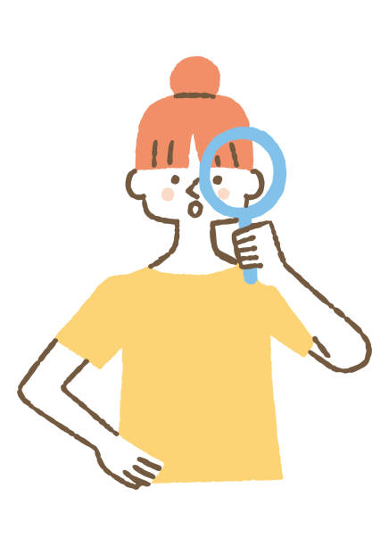 istock Young woman looking through a magnifying glass_color 1549551137