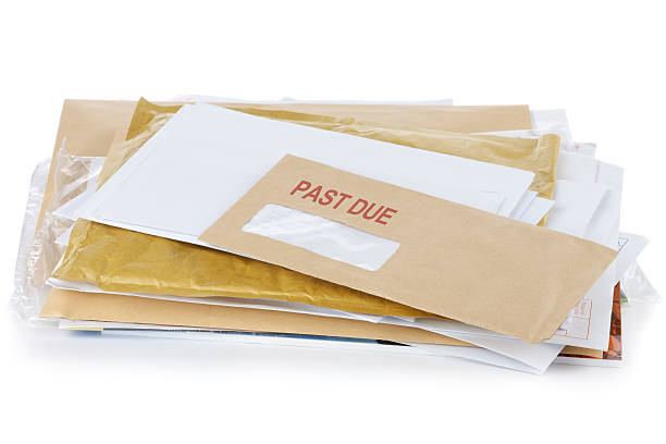 Past due letter Post with a red "past due" stamp. Partially visible address on the top envelope is lorem ipsum text. deadline photos stock pictures, royalty-free photos & images